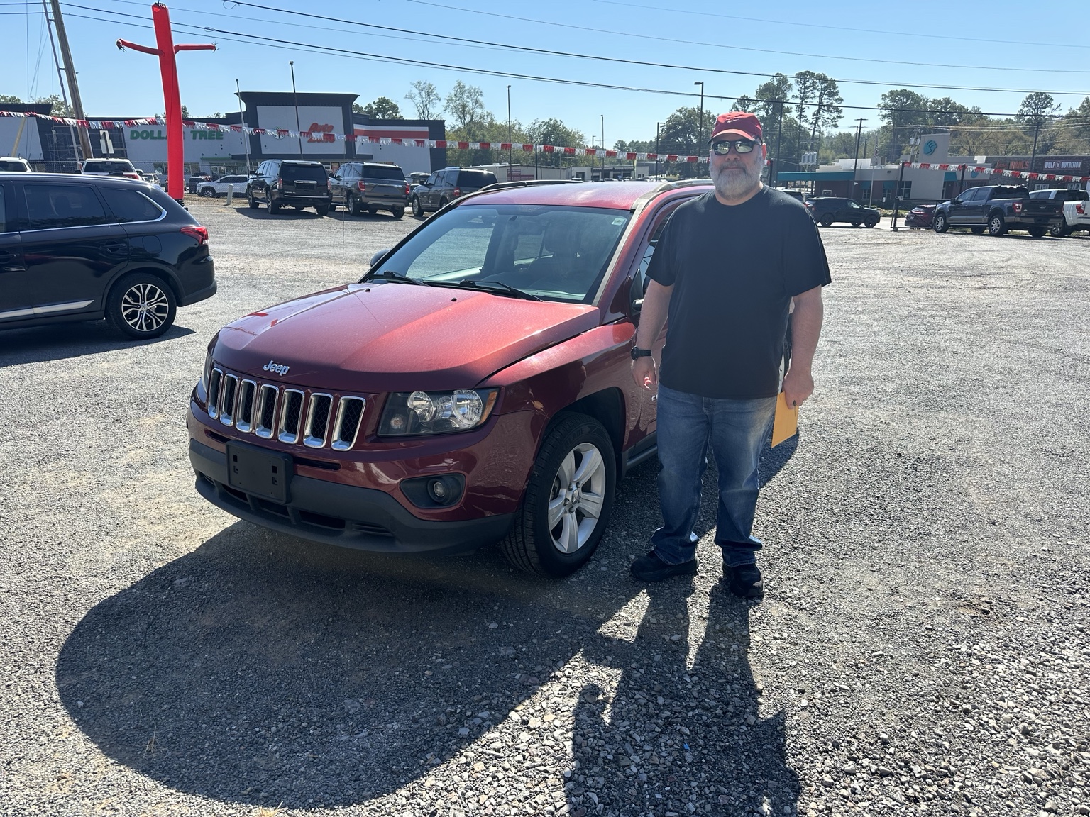 Albert with their 2017 Jeep Compass Sport purchased from TMT Motors