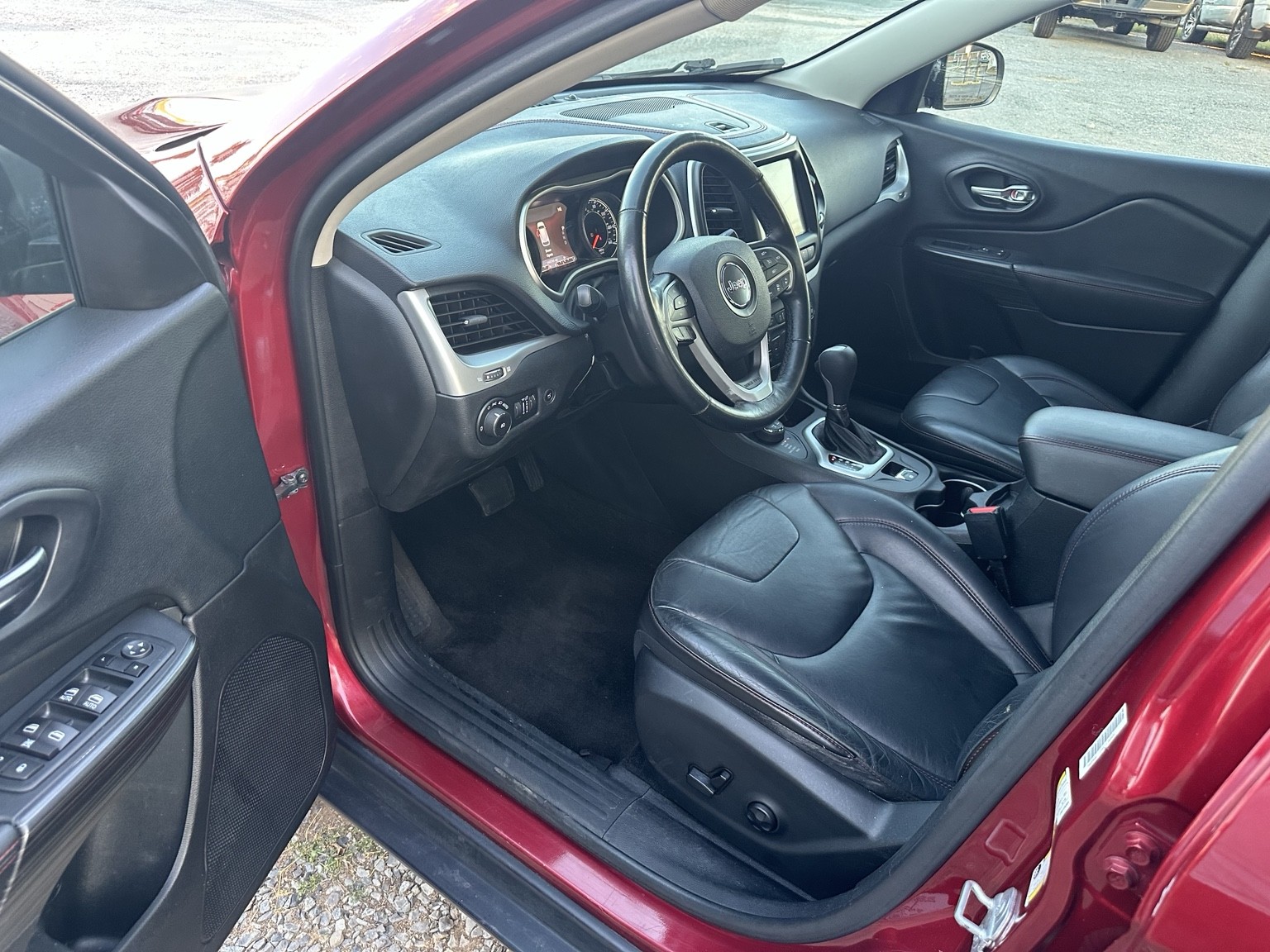 Red 2015 Jeep Cherokee Trailhawk interior view