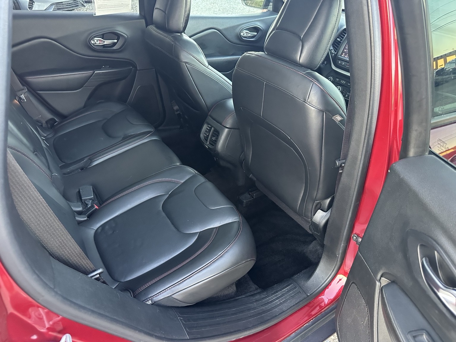 Red 2015 Jeep Cherokee Trailhawk rear seating