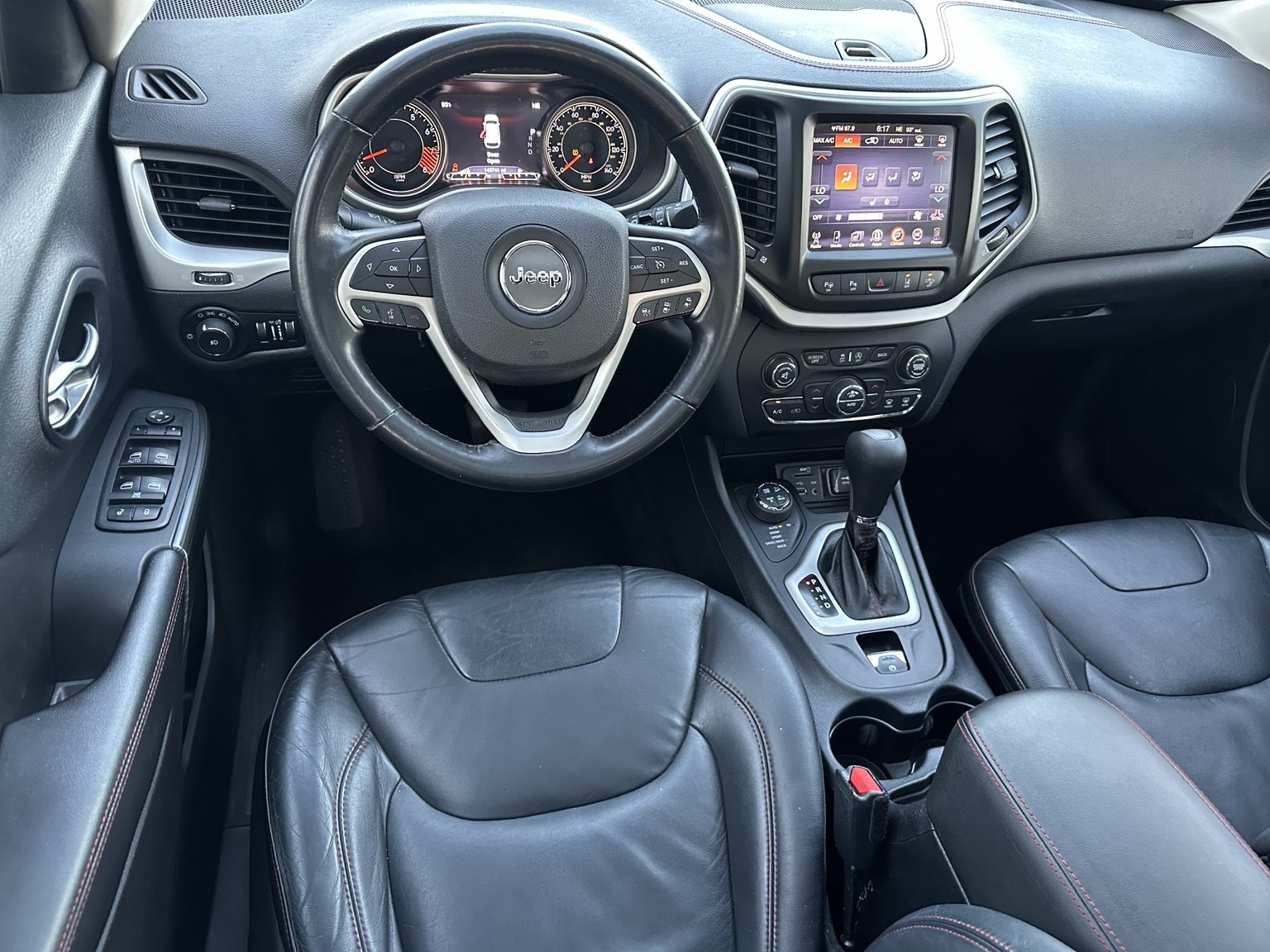 Red 2015 Jeep Cherokee Trailhawk engine compartment