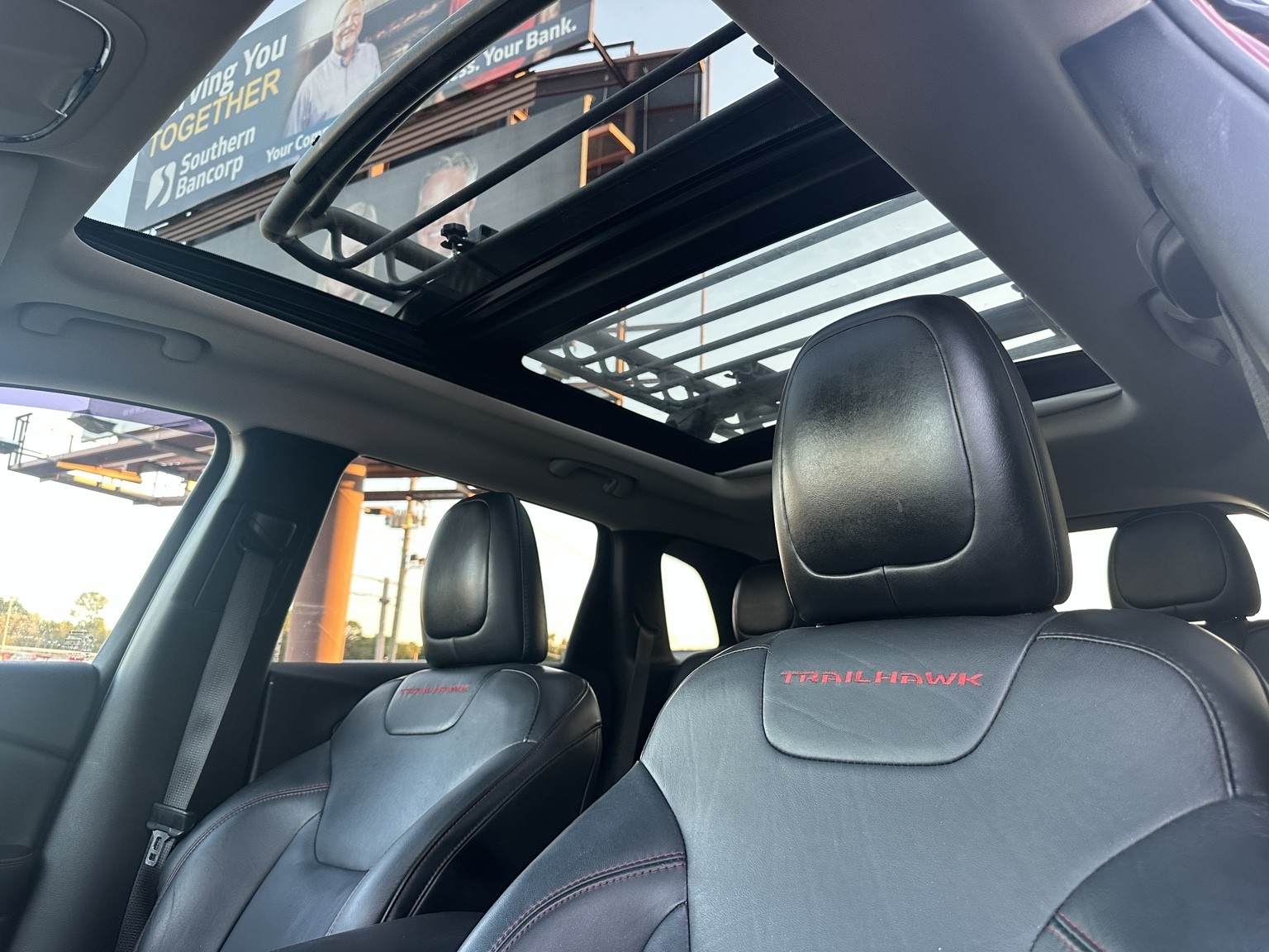 Red 2015 Jeep Cherokee Trailhawk wheel and tire