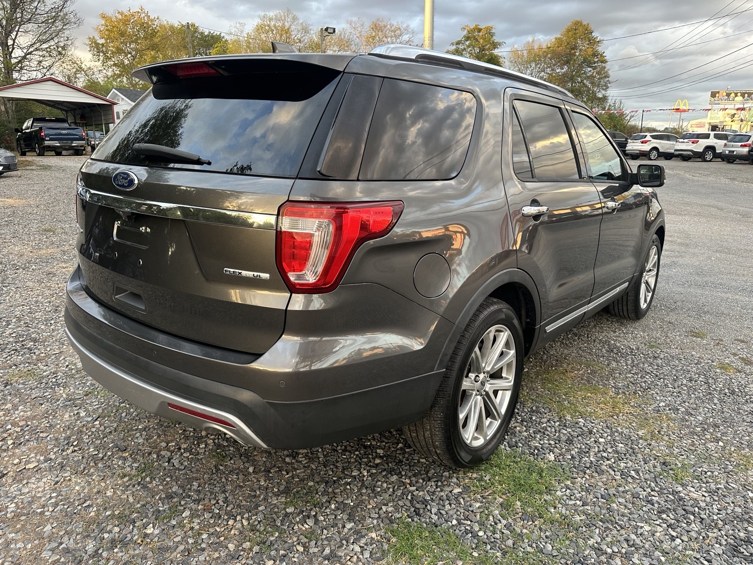 Gray 2016 Ford Explorer Limited side exterior view