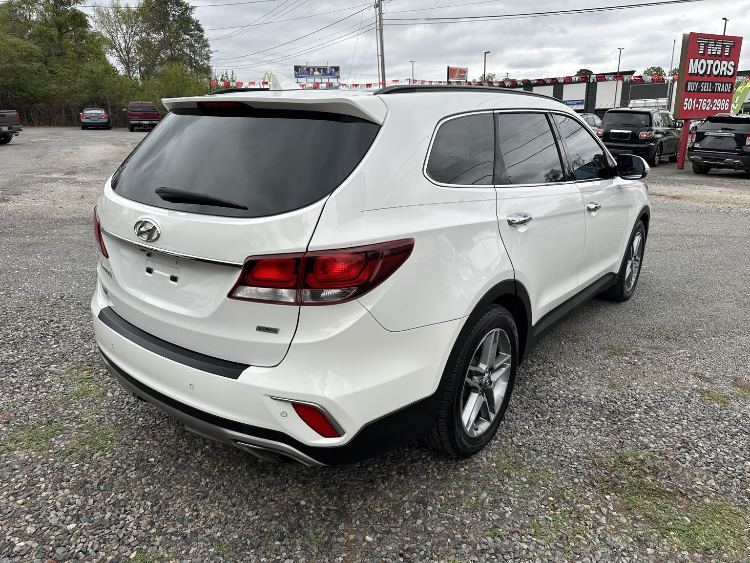 White 2017 Hyundai Santa Fe SE Ultimate side exterior view
