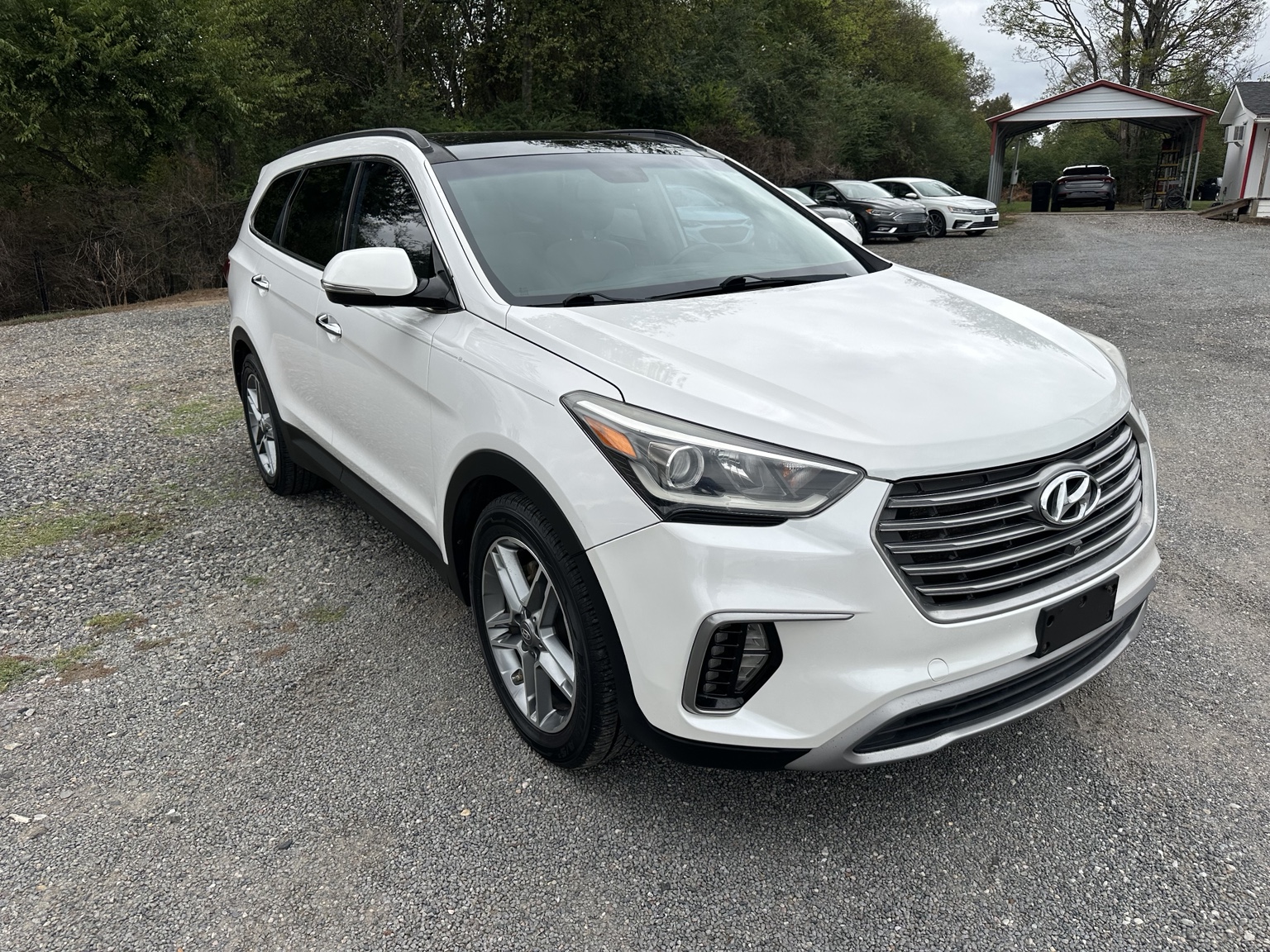 White 2017 Hyundai Santa Fe SE Ultimate rear exterior view