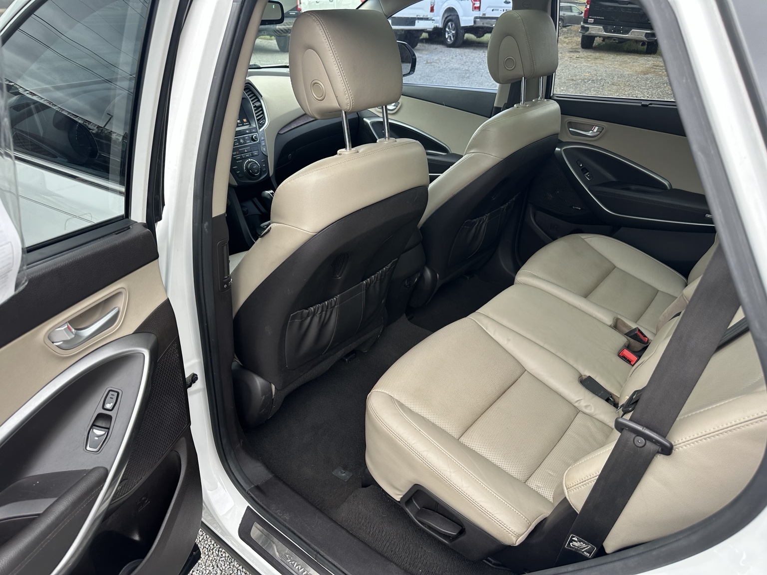 White 2017 Hyundai Santa Fe SE Ultimate dashboard and controls
