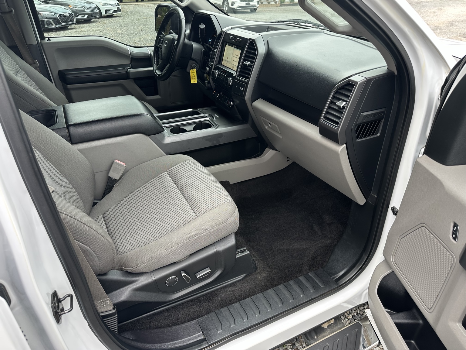 White 2018 Ford F-150 XLT Crew Cab rear seating