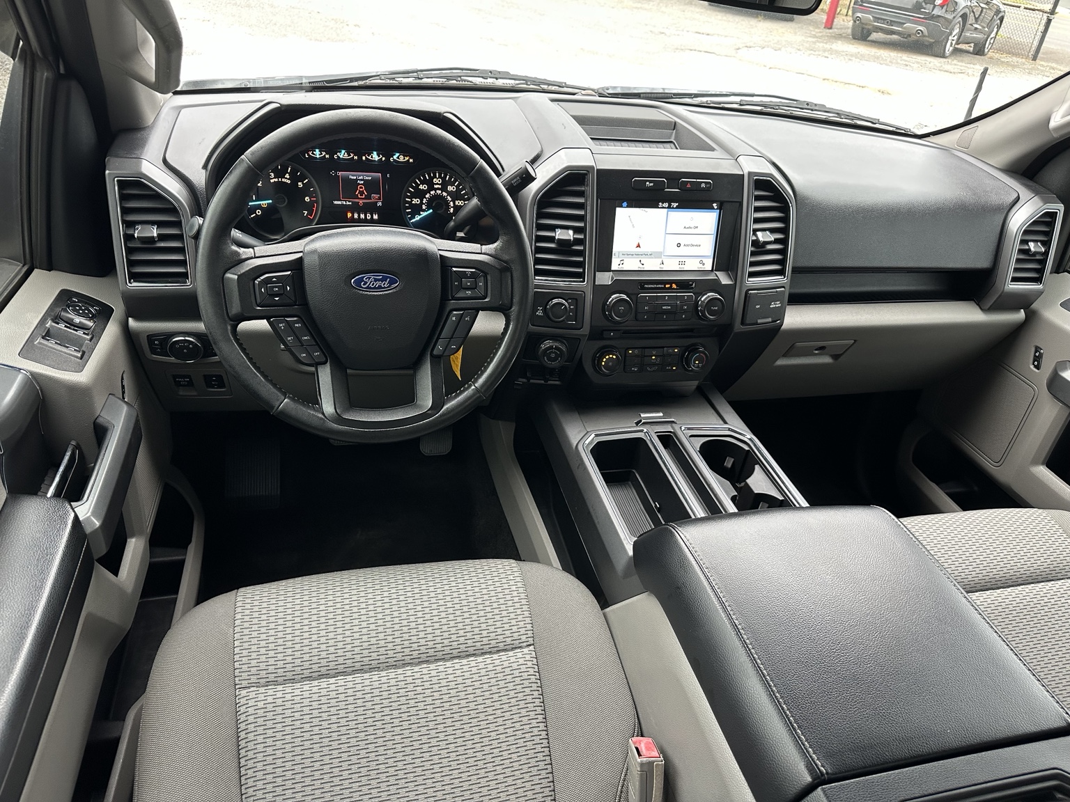 White 2018 Ford F-150 XLT Crew Cab cargo area