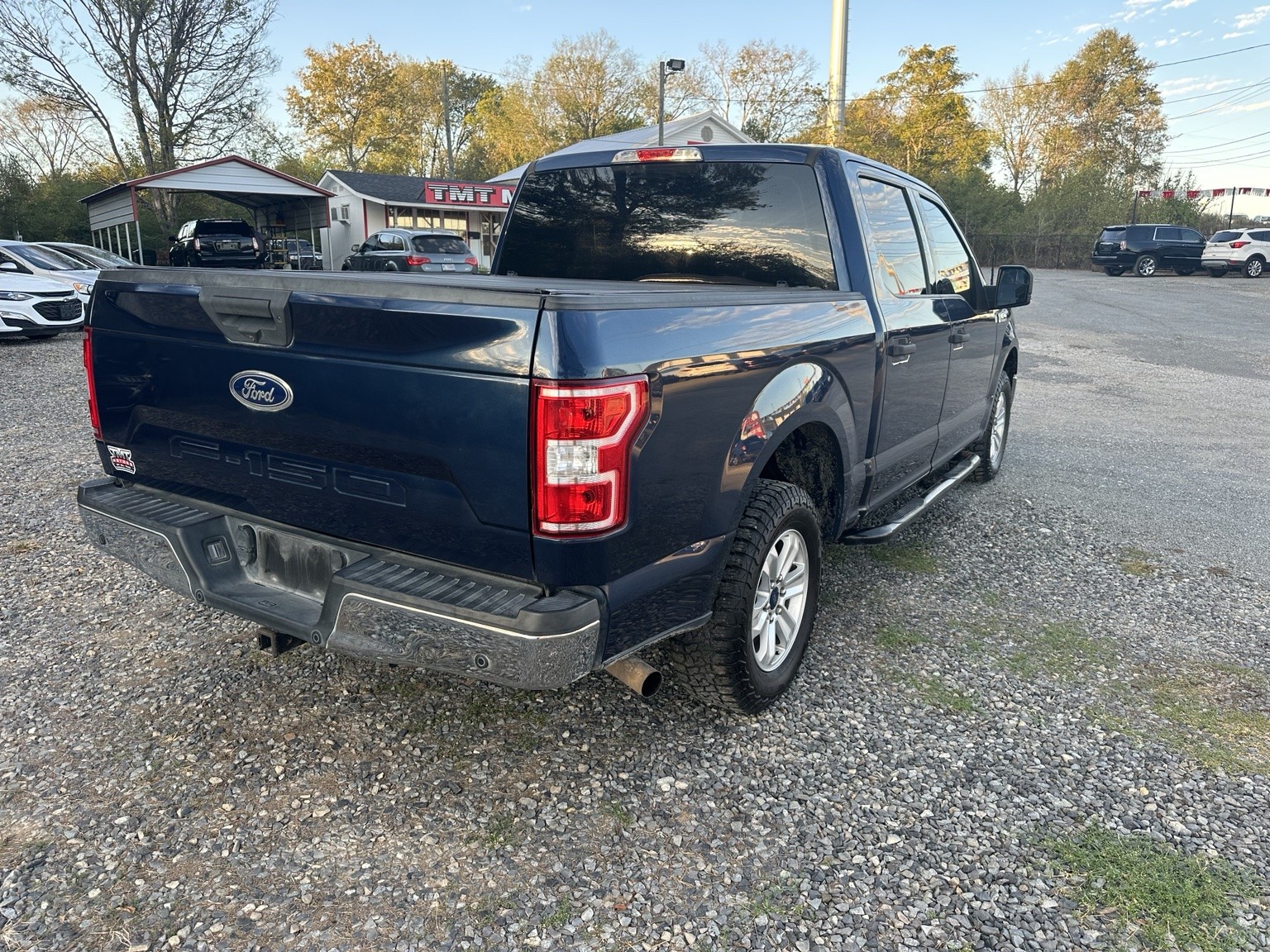 Blue 2018 Ford F-150 Crew Cab XLT side exterior view