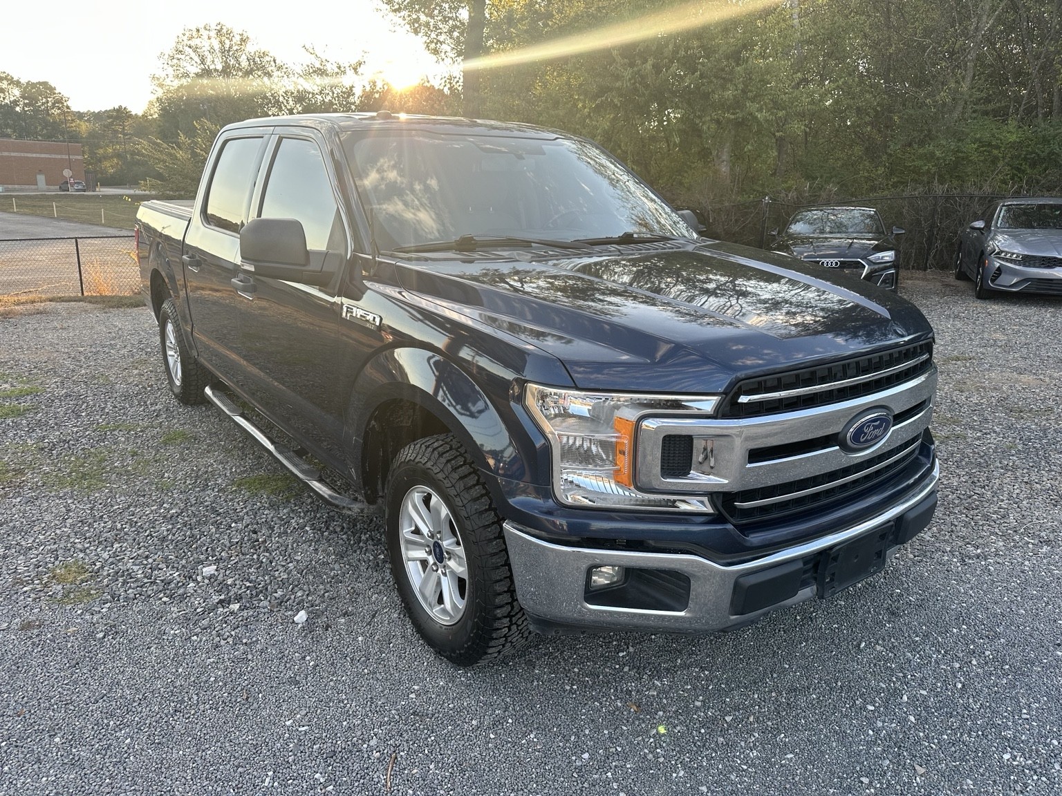 Blue 2018 Ford F-150 Crew Cab XLT rear exterior view
