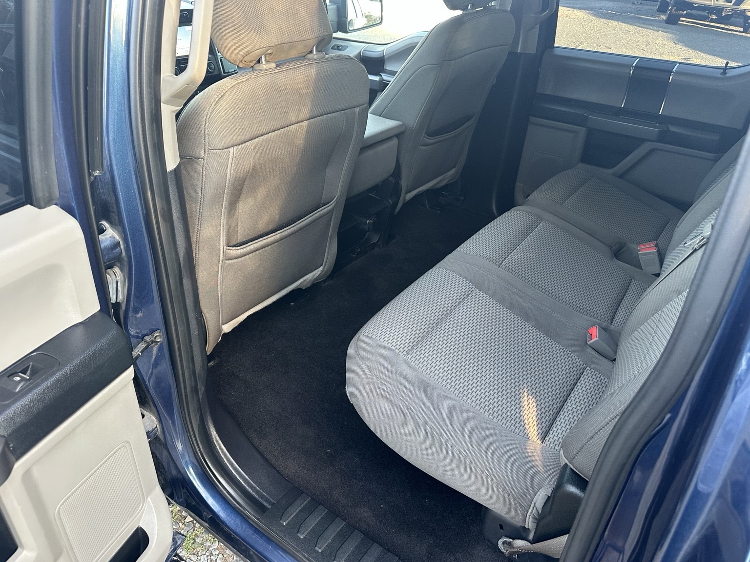 Blue 2018 Ford F-150 Crew Cab XLT dashboard and controls