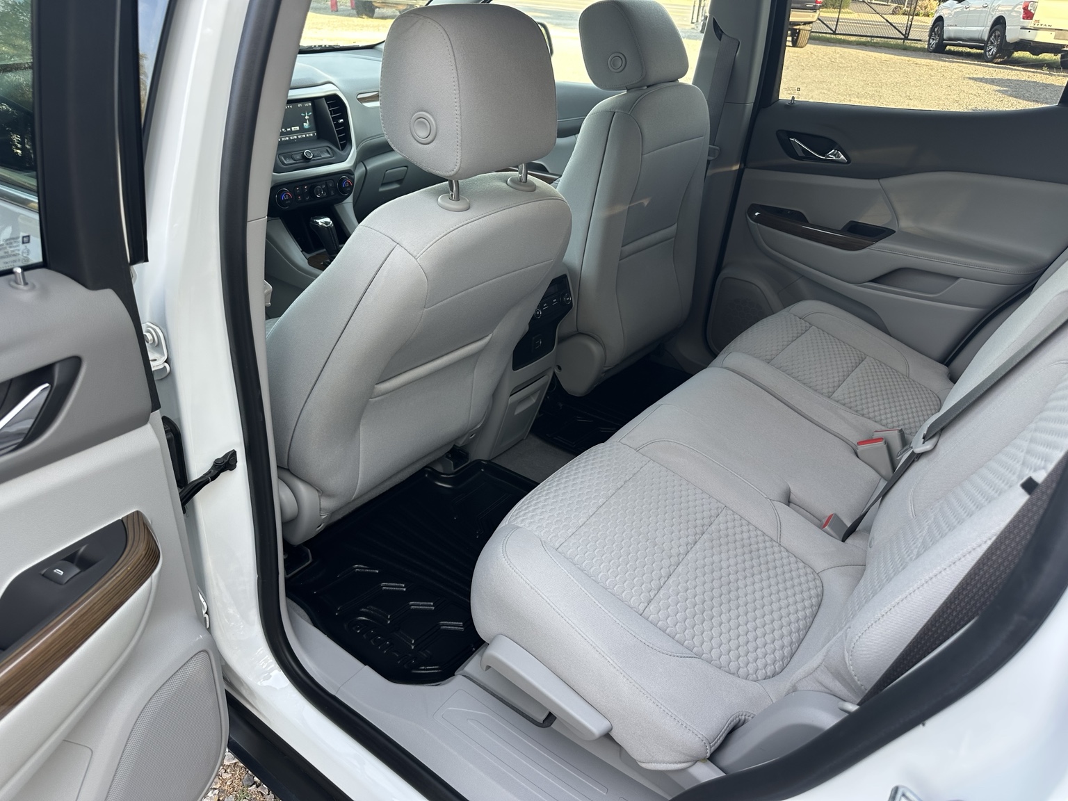 White 2019 GMC Acadia SLE dashboard and controls