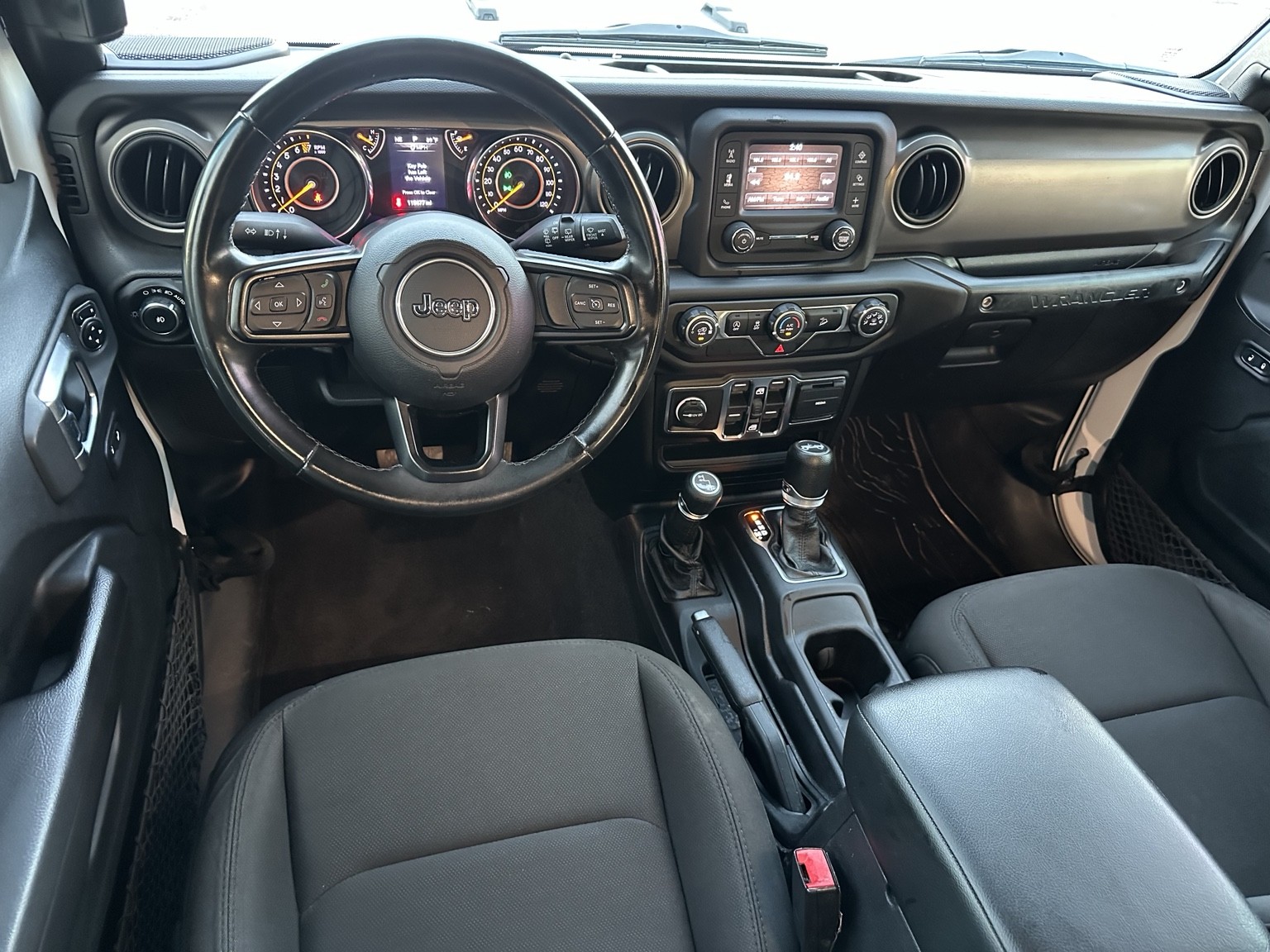 White 2020 Jeep Wrangler Sport engine compartment
