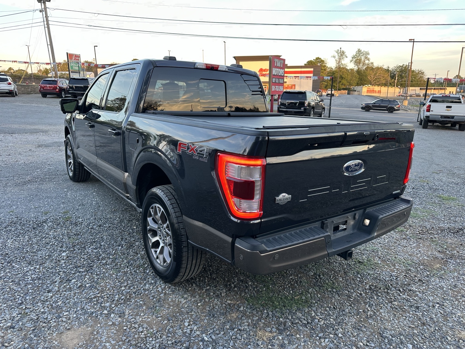 Dark gray 2021 Ford F-150 King Ranch side exterior view