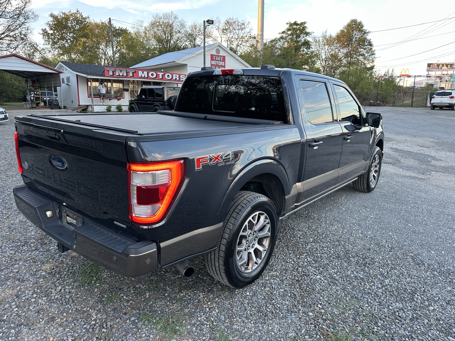 Dark gray 2021 Ford F-150 King Ranch rear exterior view