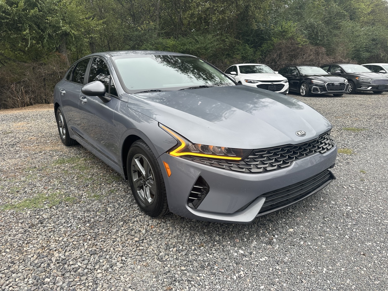 Gray 2021 Kia K5 LXS rear exterior view